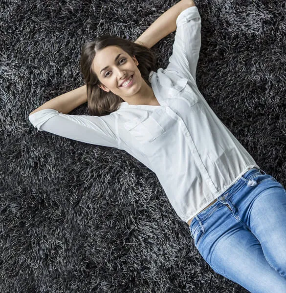 Lady-chilling-on-carpet | All Floors Design Centre